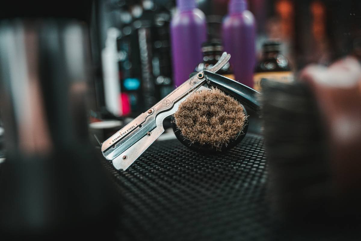 a close up of a hair brush on a table